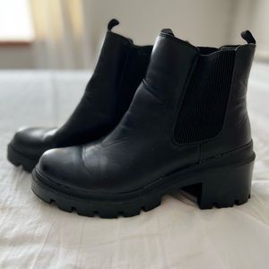 Black “Chelsea” style boots